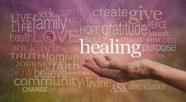 Healer's outstretched open hand surrounded by random wise healing words on a rustic stone effect background